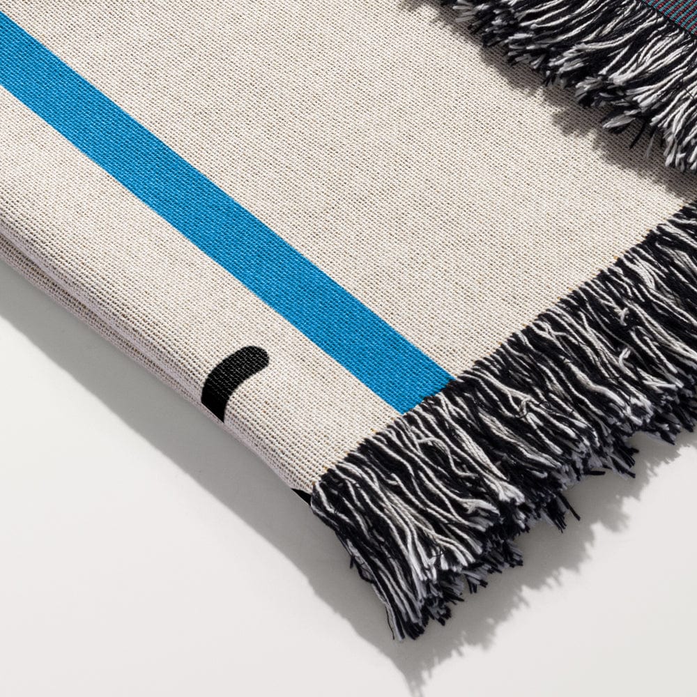 Blanket draped over a sofa