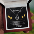 Sterling silver baby feet necklace for an expecting mom with keepsake message card